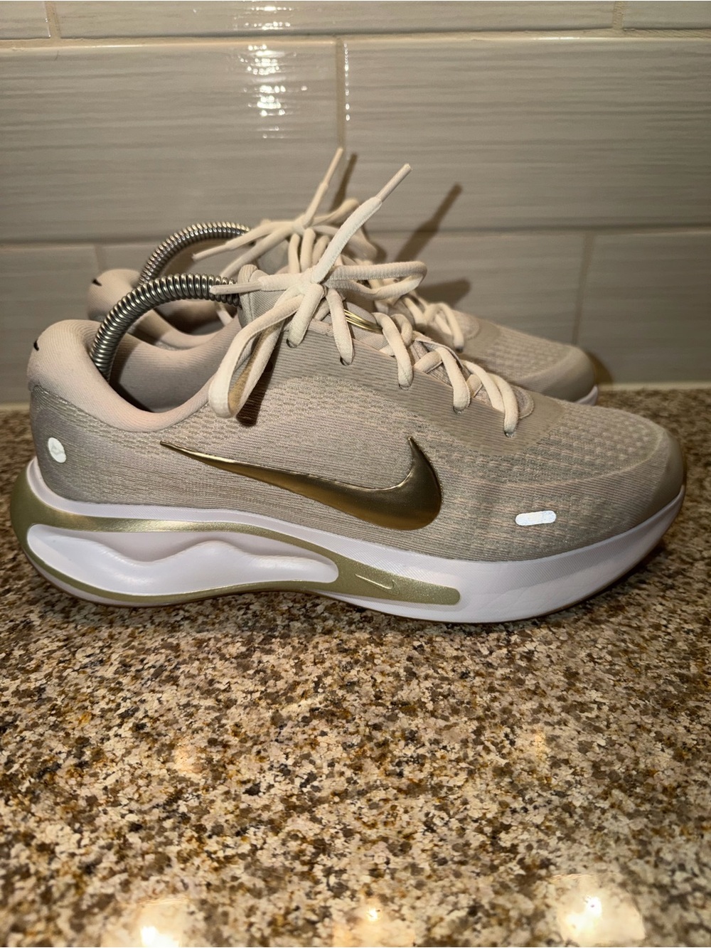 Nike Women’s Athletic Shoes - Beige with Metallic Gold Swoosh